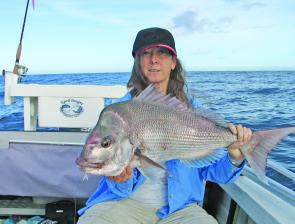 This 5kg snapper was Deb Peter's PB at the time. She caught the red on a bleeding crystal shad coloured Gambler 5” Super Stud soft plastic. The rod, as always, is her favourite EGrell S10.